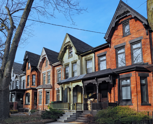 Row of Victorian style brick houses