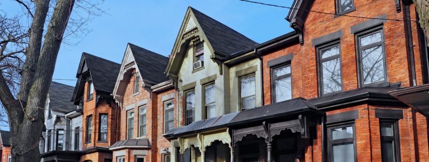 Row of Victorian style brick houses