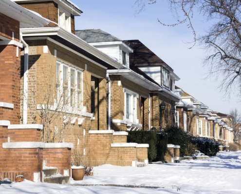 Row of homes in snow
